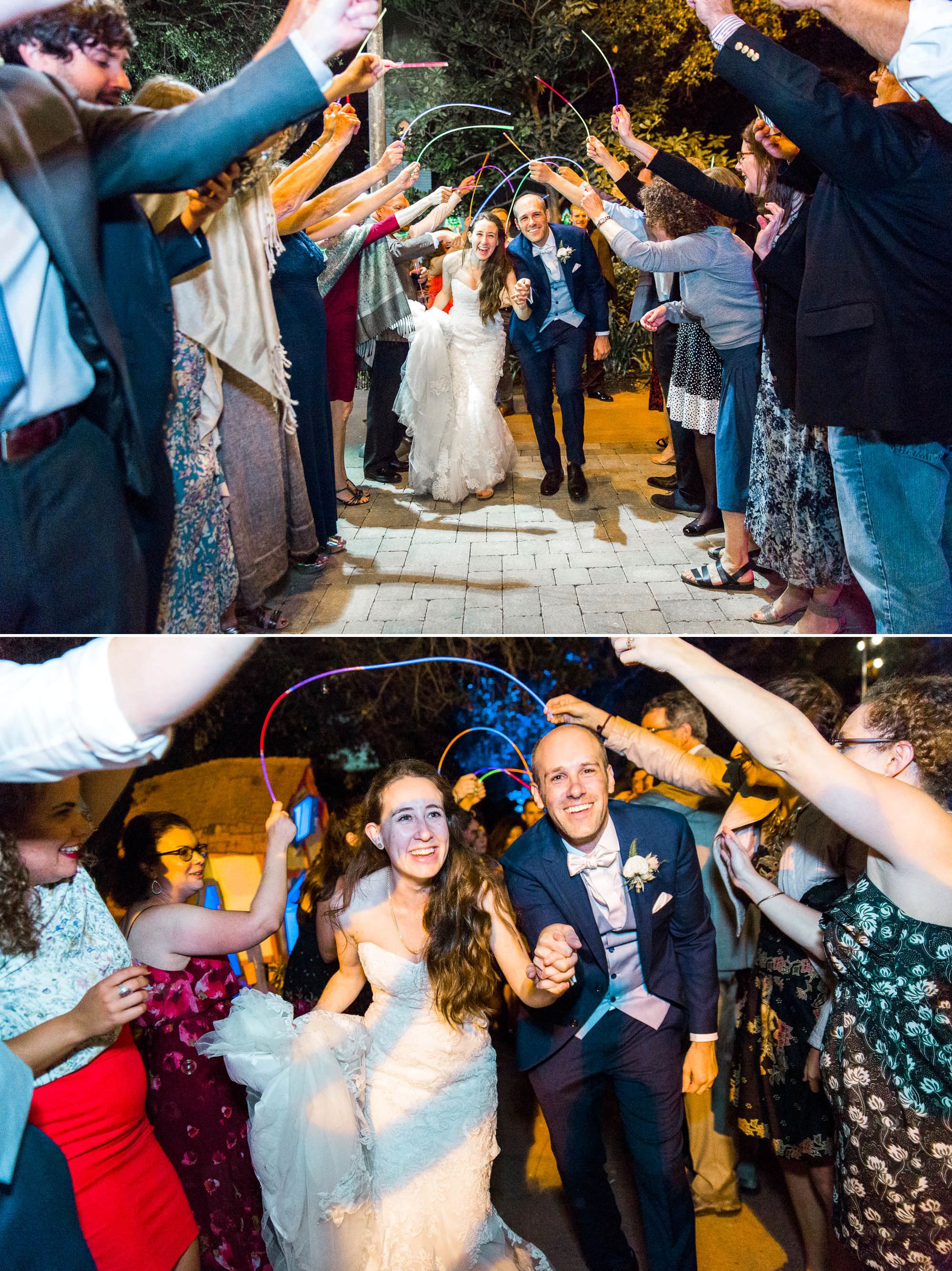 just married couple walking through a glow stick tunnel