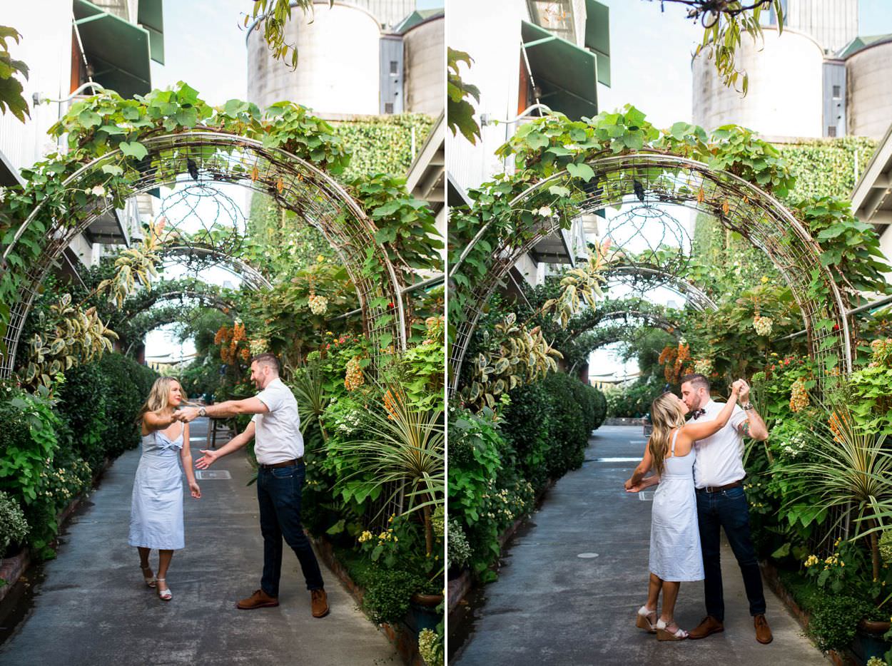 couple under an arch of vines